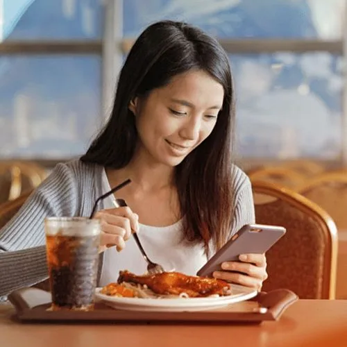 Guest checking the restaurant social media page