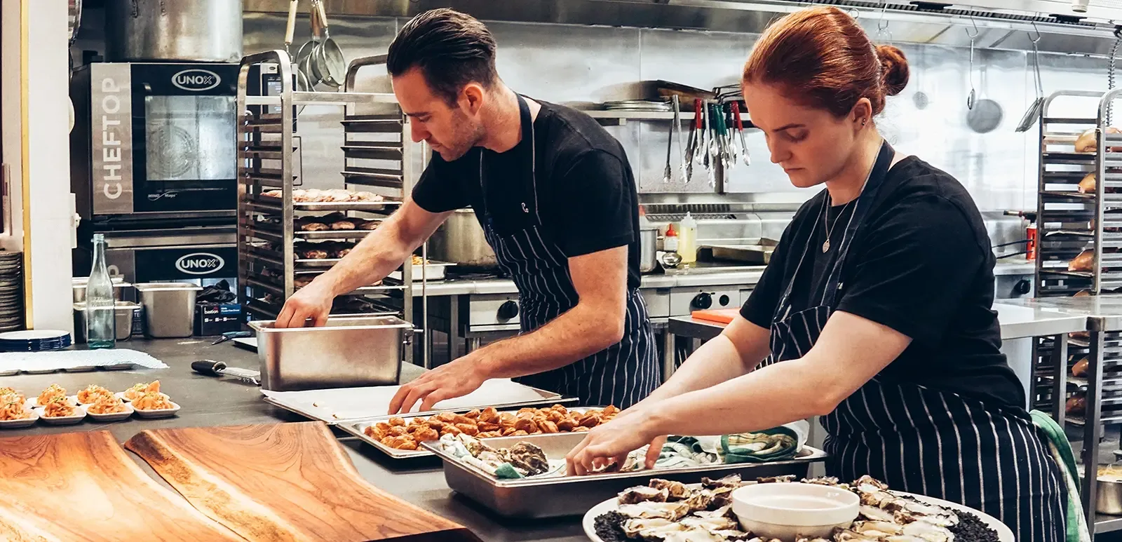 Restaurant staff prepping the food for the day service