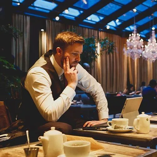 Restaurant owner calculating the true cost of using OpenTable reservation management system
